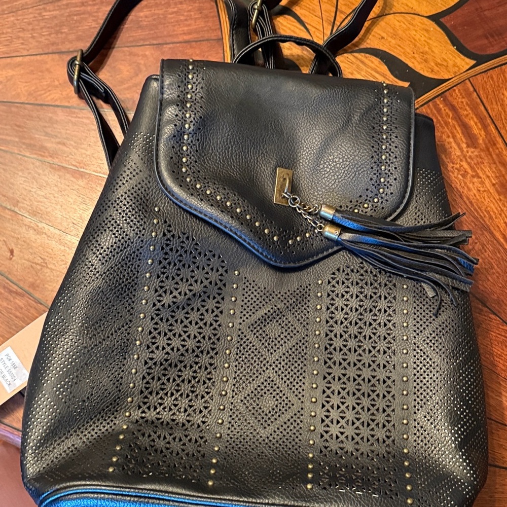 Chic Black Perforated Backpack